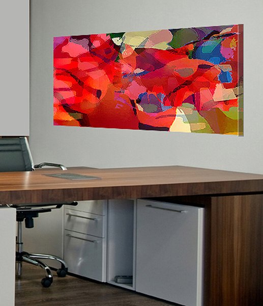 Abstract painting 'Abstract in Red': vivid overlapping red, orange and blue organic shapes, shown mounted above an office desk.
